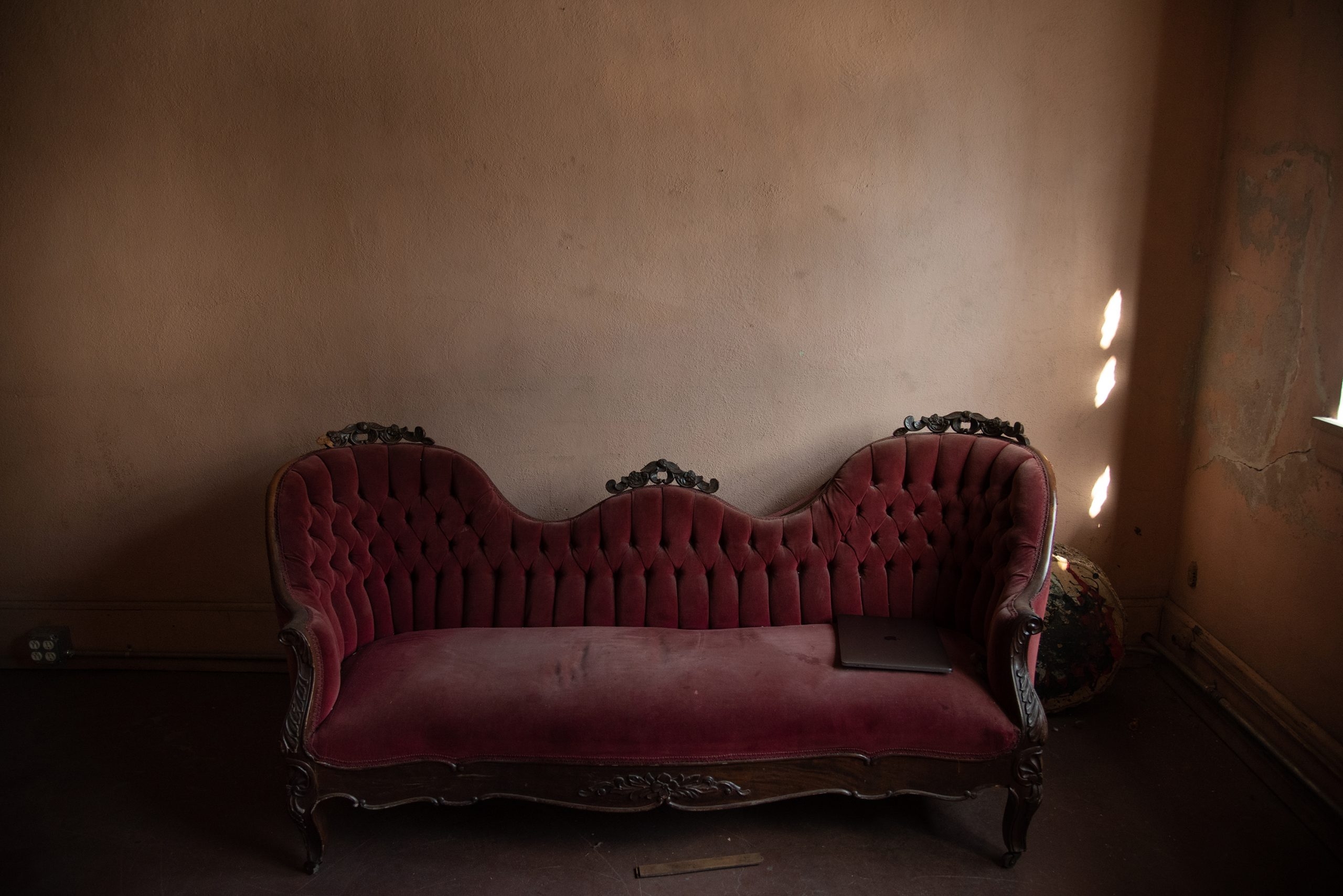 The Burgundy Couch